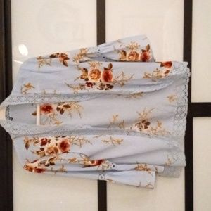 Medium sized, 100% Polyester made in China.